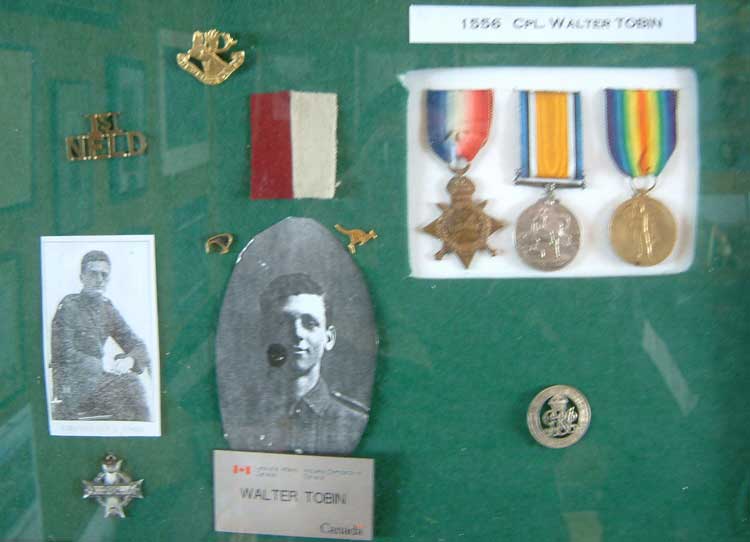 Pictures and medals which belonged to Cpl. Walter Tobin.